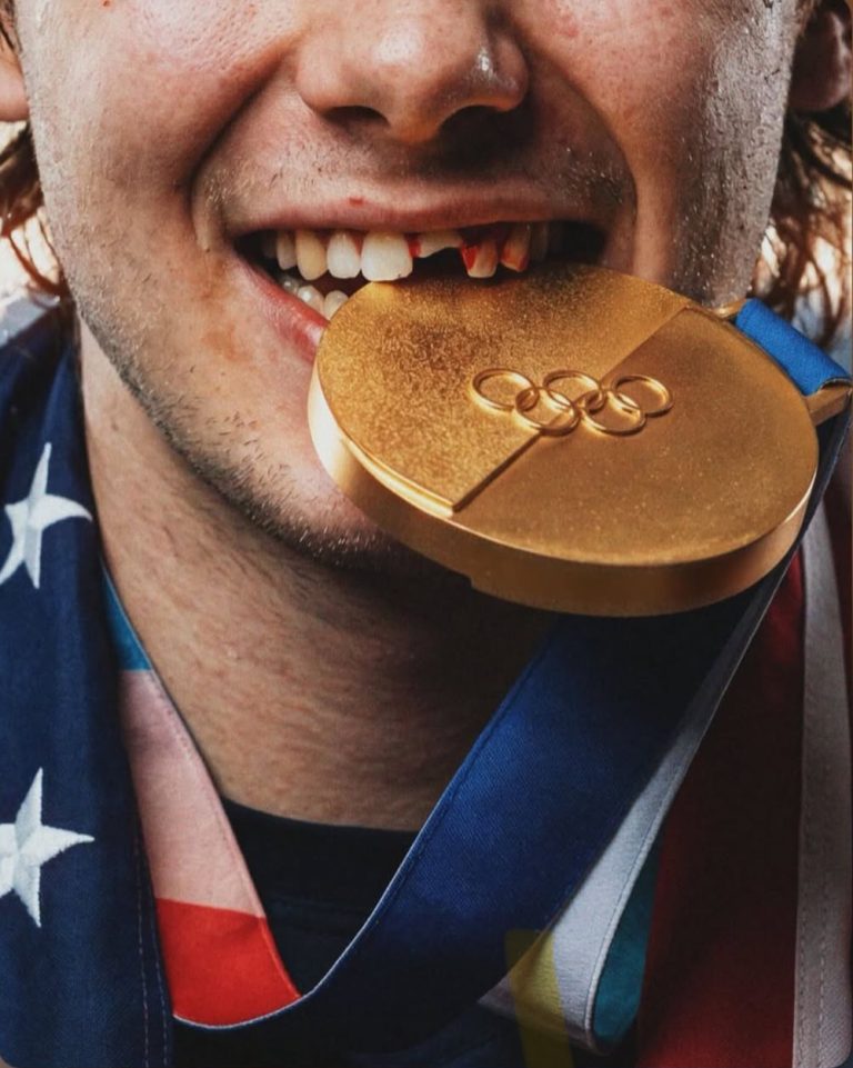Deportista con medalla olímpica
